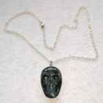 Hawks Eye carved skull, skull jewellery, skull pendant