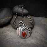 Sterling silver and orange carnelian pumpkin necklace.