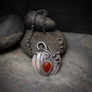Sterling silver and orange carnelian pumpkin necklace.