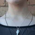 Handmade porcelain bird skull necklace
