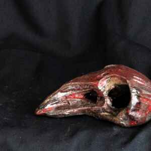 Oxblood Bird Skull Sculpture