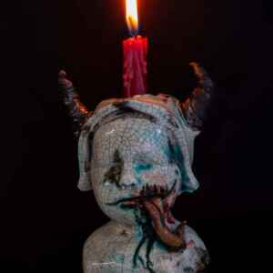 Venom tongue doll candle holder