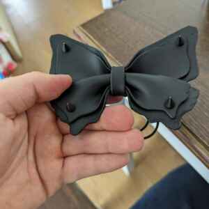 Leather butterfly bow
