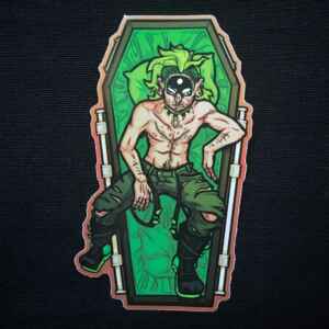 A sticker in the shape of an open coffin. Laying casually within is a grungy shirtless dude with a loosely-stapled autopsy cut up his midsection.
