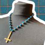 Royal blue wooden necklace with gold stainless steel inverted cross