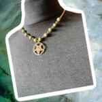 Earthy green choker with gold chain links and Baphomet pendant