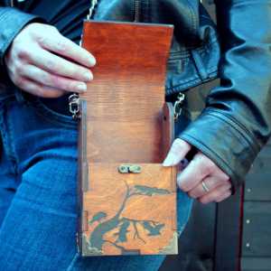 Gothic wooden shoulder purse with engraved crow design, this cross body purse or gothic bag has a living hinge design and is a vegan bag