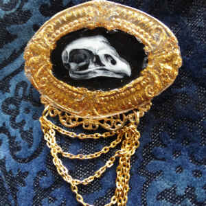 Vulture skull brooch