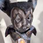 Freestanding bat jester ceramic candle holder