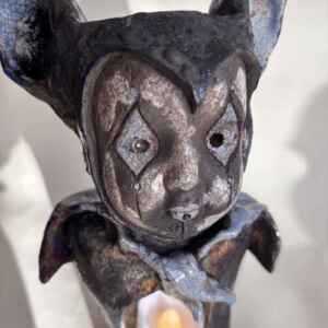 Freestanding bat jester ceramic candle holder